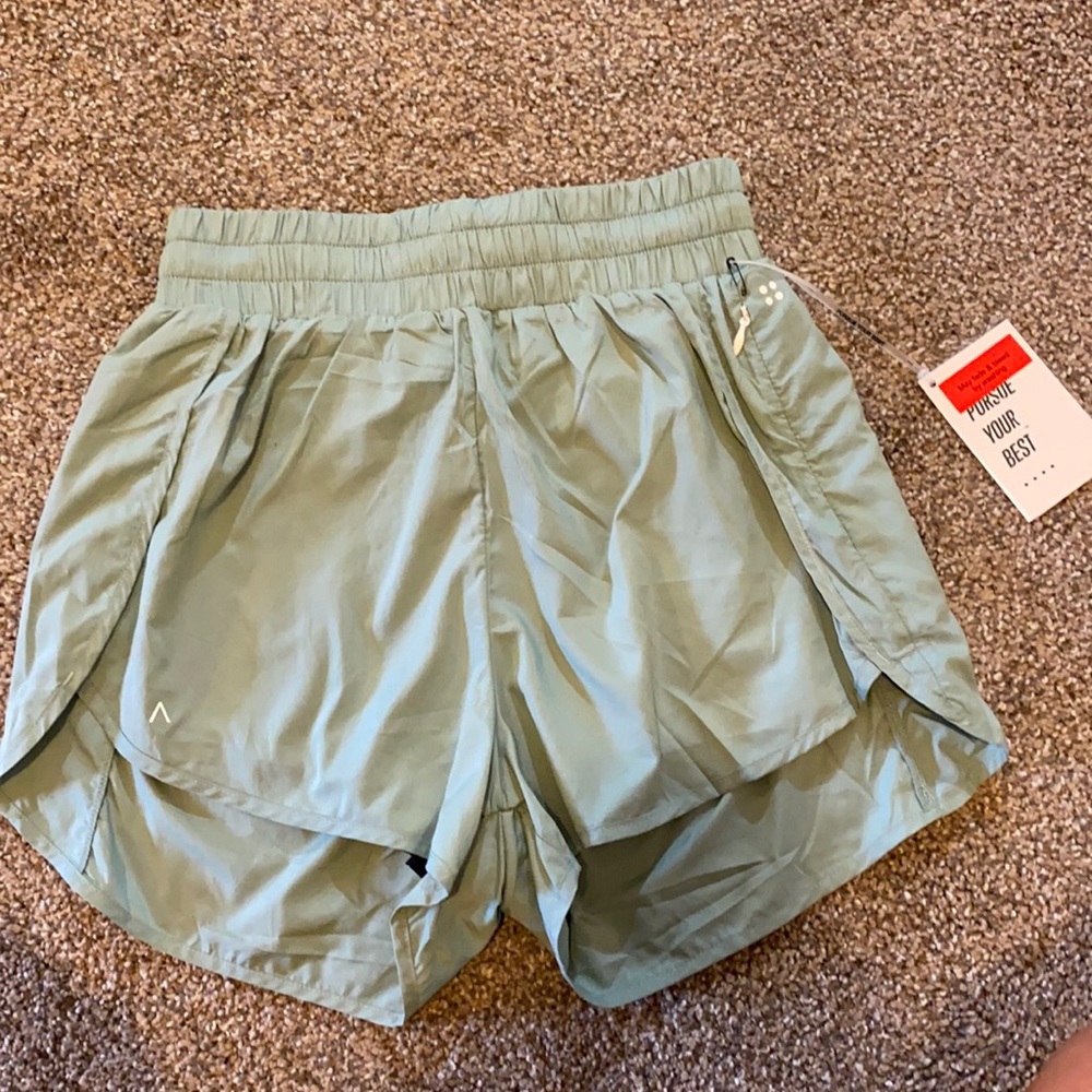 ACTA mint colored lined shorts